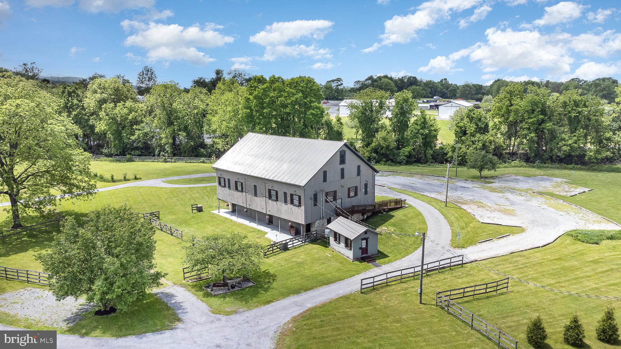 1554 Williams Grove Road Dillsburg, PA 17019 - Photo 4 of 75 a view of a swimming pool with a yard and plants