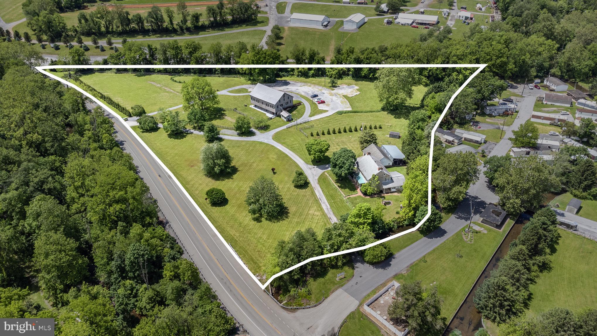 1554 Williams Grove Road Dillsburg, PA 17019 - Photo 5 of 75 an aerial view of a residential houses with swimming pool and outdoor space