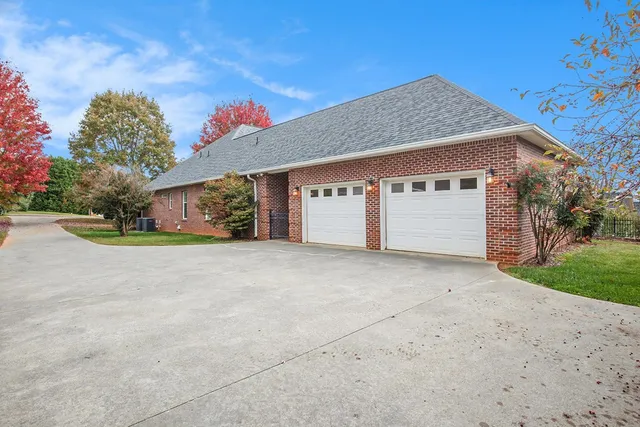 a view of garage and yard
