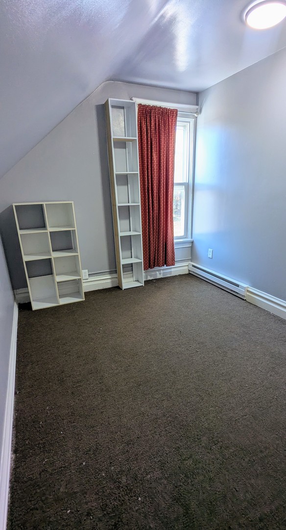 23 North Jackson Street Waukegan, IL 60085 - Photo 15 of 26 an empty room with windows