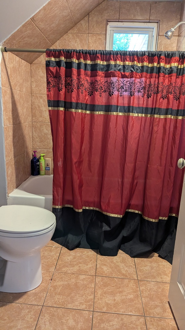 23 North Jackson Street Waukegan, IL 60085 - Photo 20 of 26 a bathroom with a sink and toilet