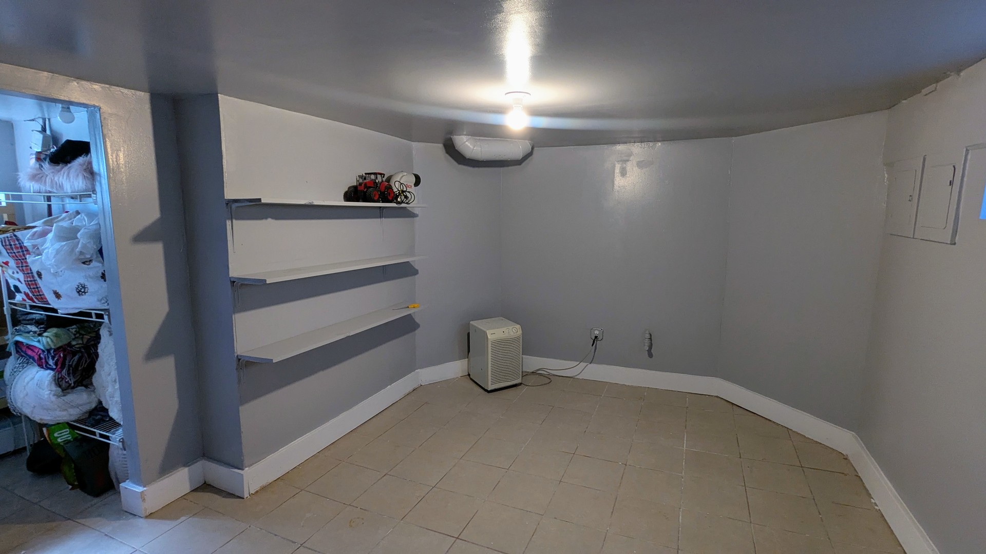 23 North Jackson Street Waukegan, IL 60085 - Photo 25 of 26 a view of storage and utility room in empty room