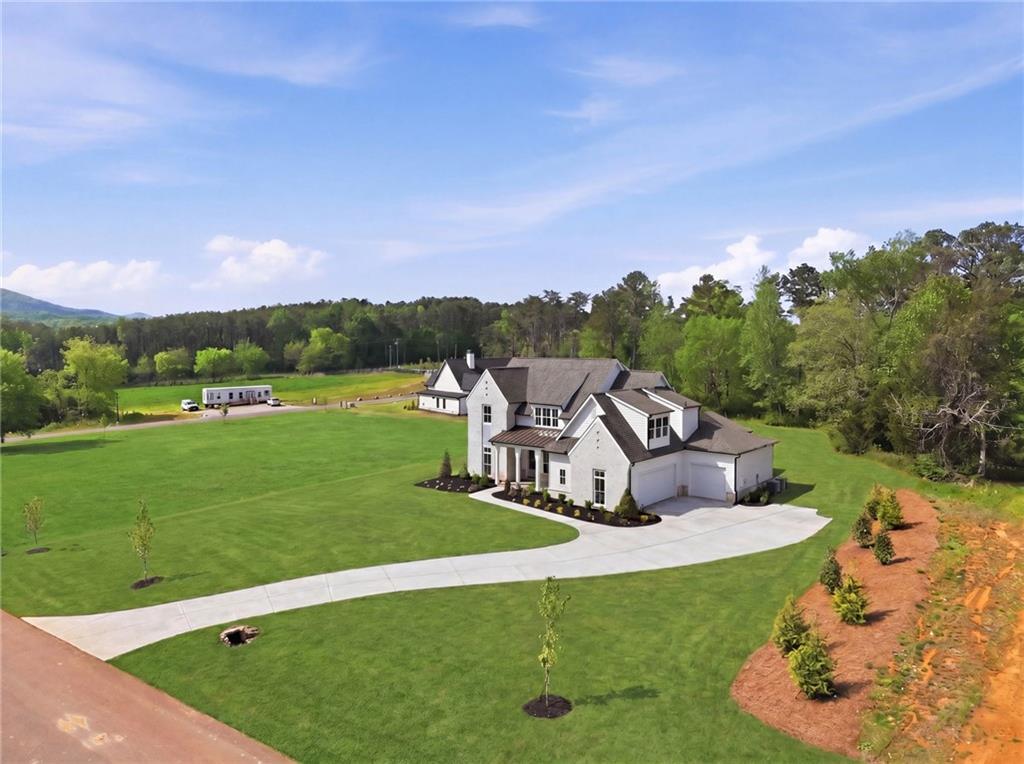 158 Palisade Drive Rydal, GA 30171 - Photo 72 of 75 a view of a garden with lawn chairs