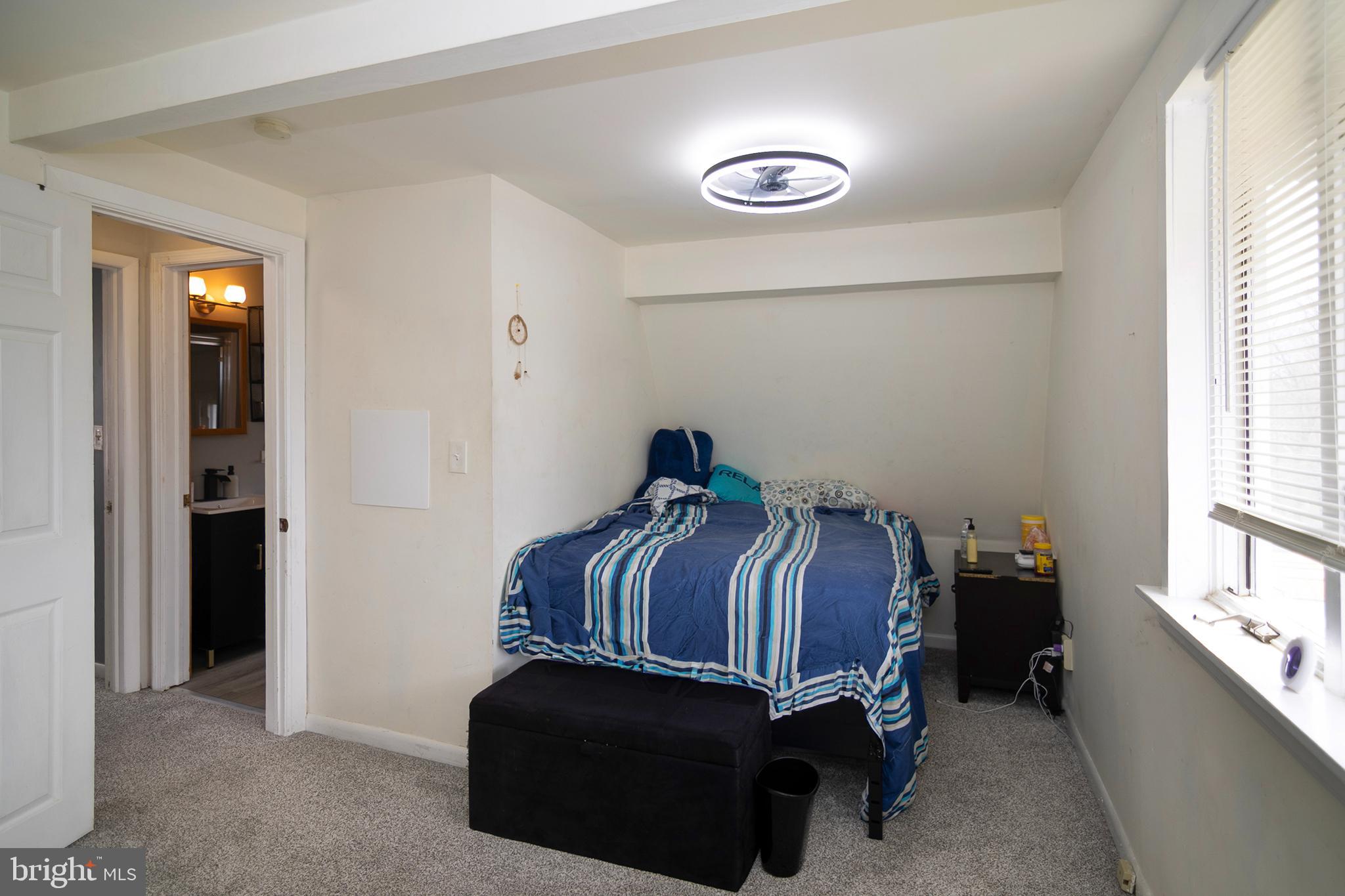 211 Chestnut Street Glendora, NJ 08029 - Photo 15 of 34 a bedroom with a bed and window