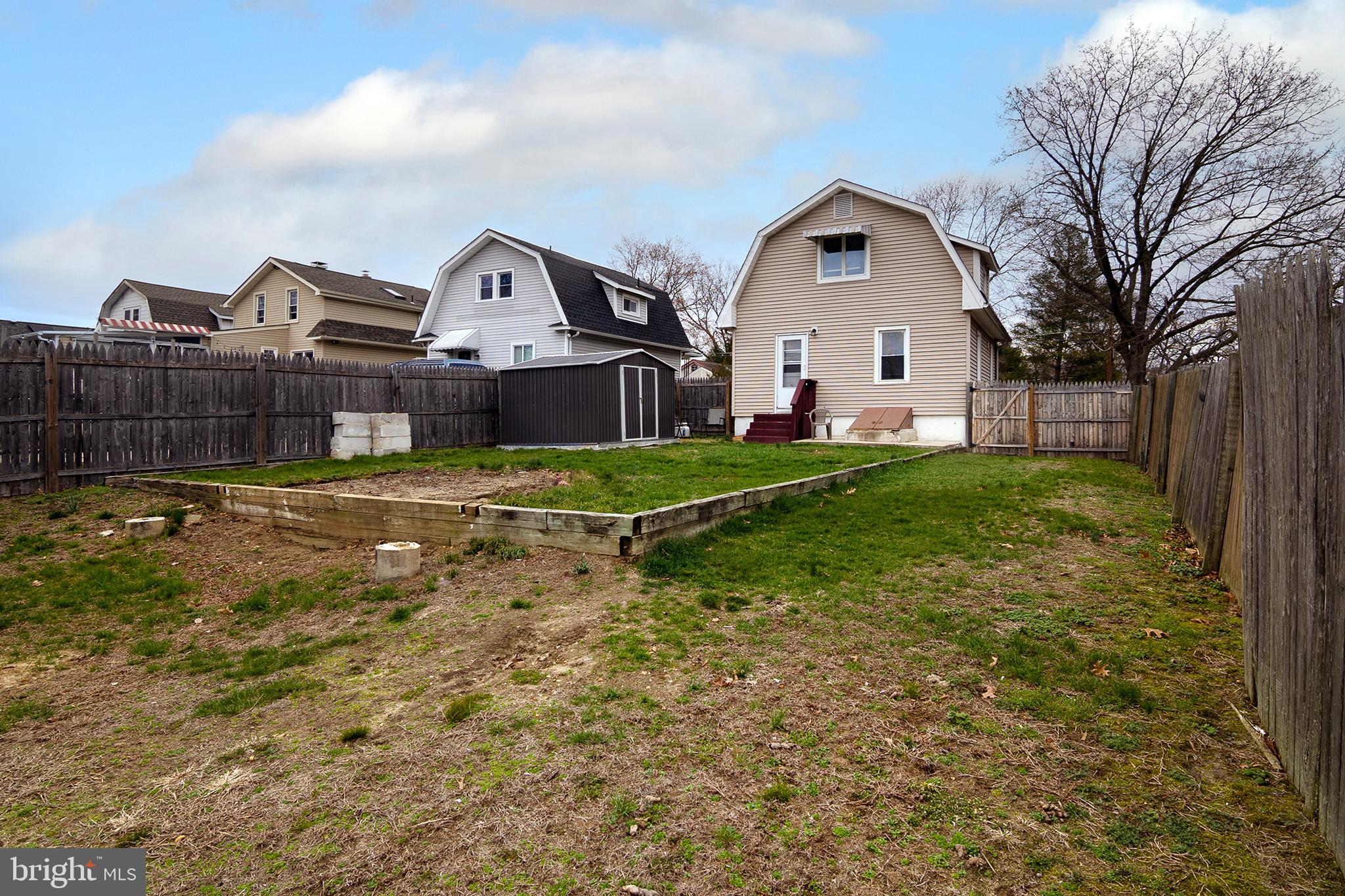 211 Chestnut Street Glendora, NJ 08029 - Photo 29 of 34 a view of a big house with a big yard and large trees