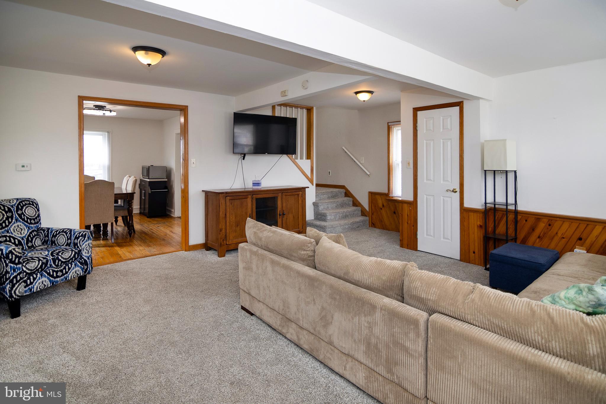 211 Chestnut Street Glendora, NJ 08029 - Photo 5 of 34 a living room with furniture and a flat screen tv