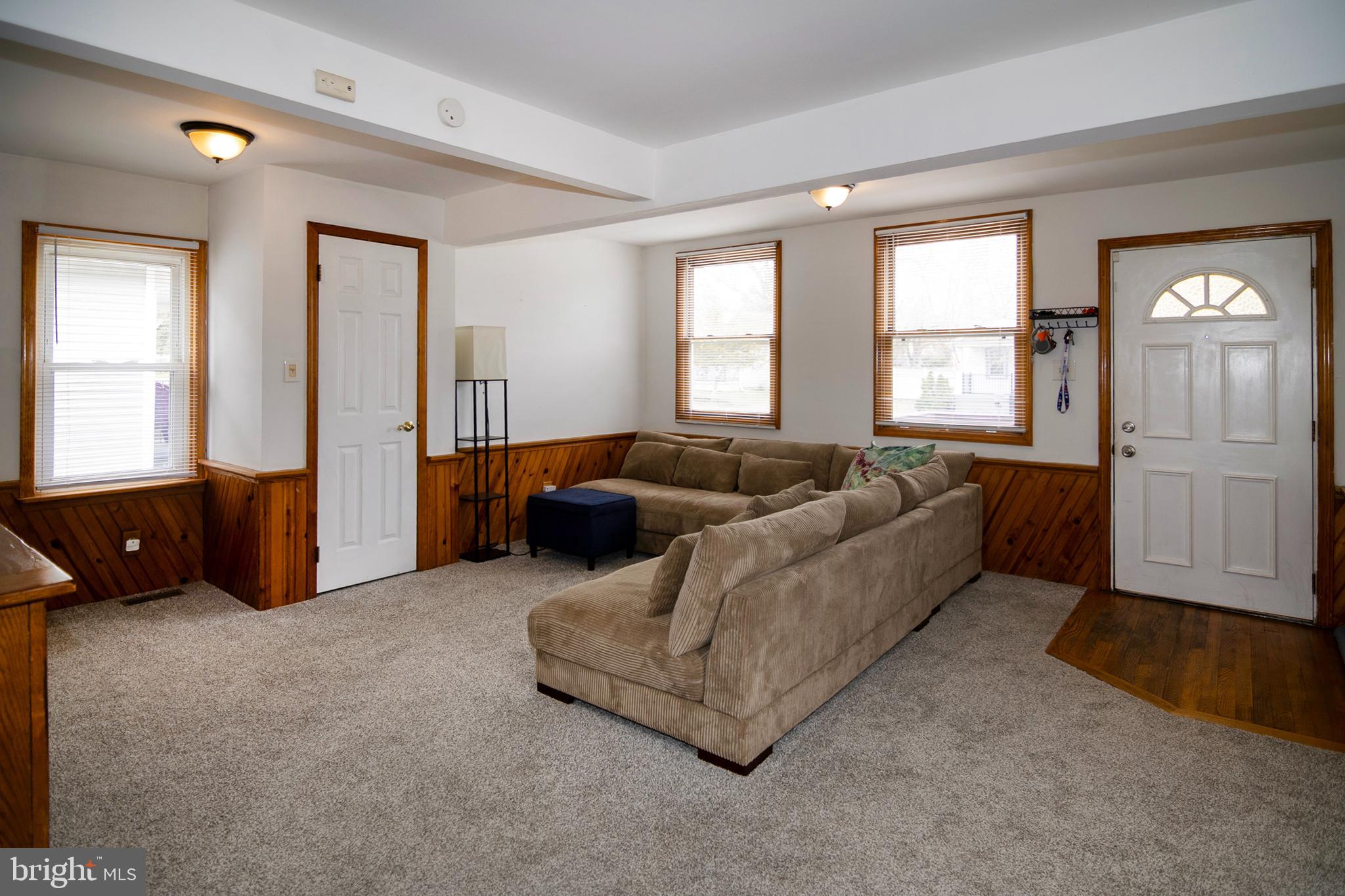 211 Chestnut Street Glendora, NJ 08029 - Photo 6 of 34 a living room with furniture and a window