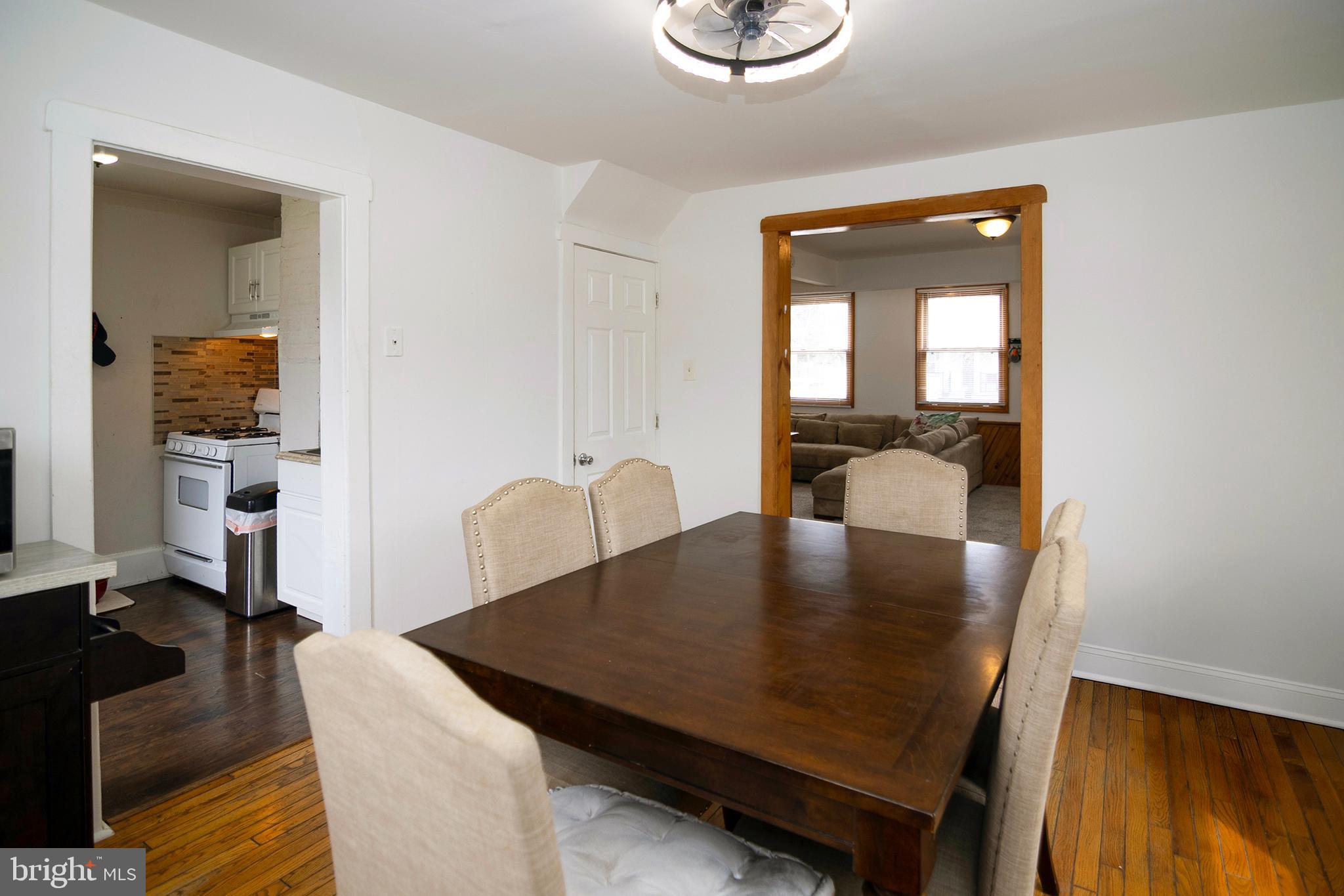 211 Chestnut Street Glendora, NJ 08029 - Photo 8 of 34 a view of a dining room with furniture and a window
