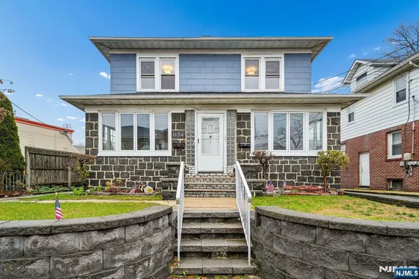 a view of house with a swimming pool