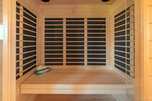 a view of a bedroom with a window and stairs