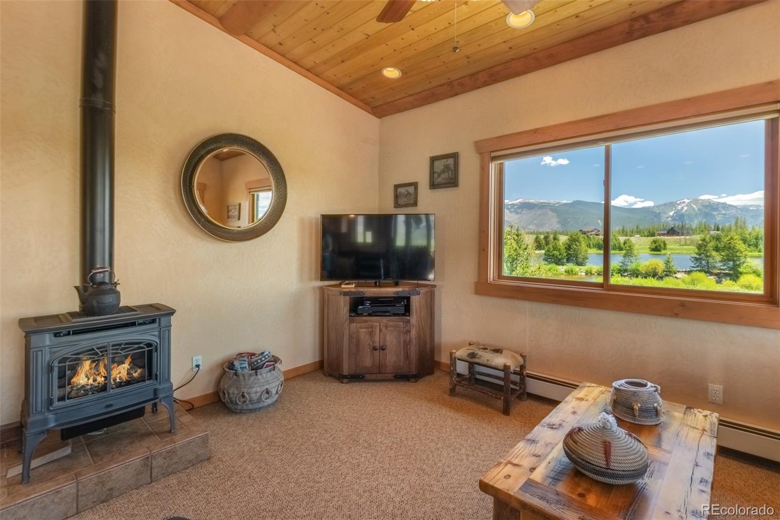 1443 Gcr 49 Grand Lake Grand Lake, CO 80447 - Photo 9 of 50 a view of a livingroom with furniture and a flat screen tv