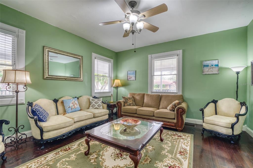 304 15th Street West Bradenton, FL 34205 - Photo 13 of 75 a living room with furniture and a wooden floor