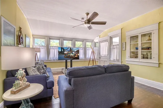 a kitchen with stainless steel appliances granite countertop a sink a stove and refrigerator