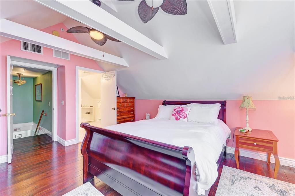 304 15th Street West Bradenton, FL 34205 - Photo 51 of 75 a bedroom with a bed and a dresser