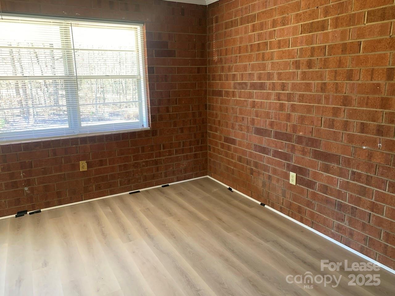 8544 Babe Drive Terrell, NC 28682 - Photo 18 of 20 a bathroom with a bathtub