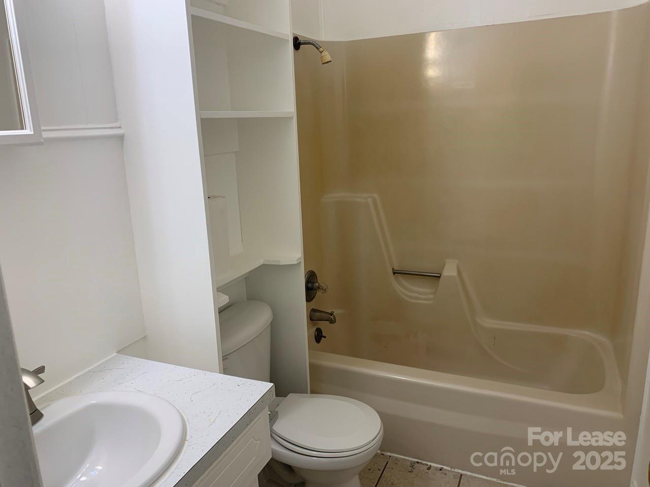 8544 Babe Drive Terrell, NC 28682 - Photo 7 of 20 a bathroom with a sink a toilet and shower