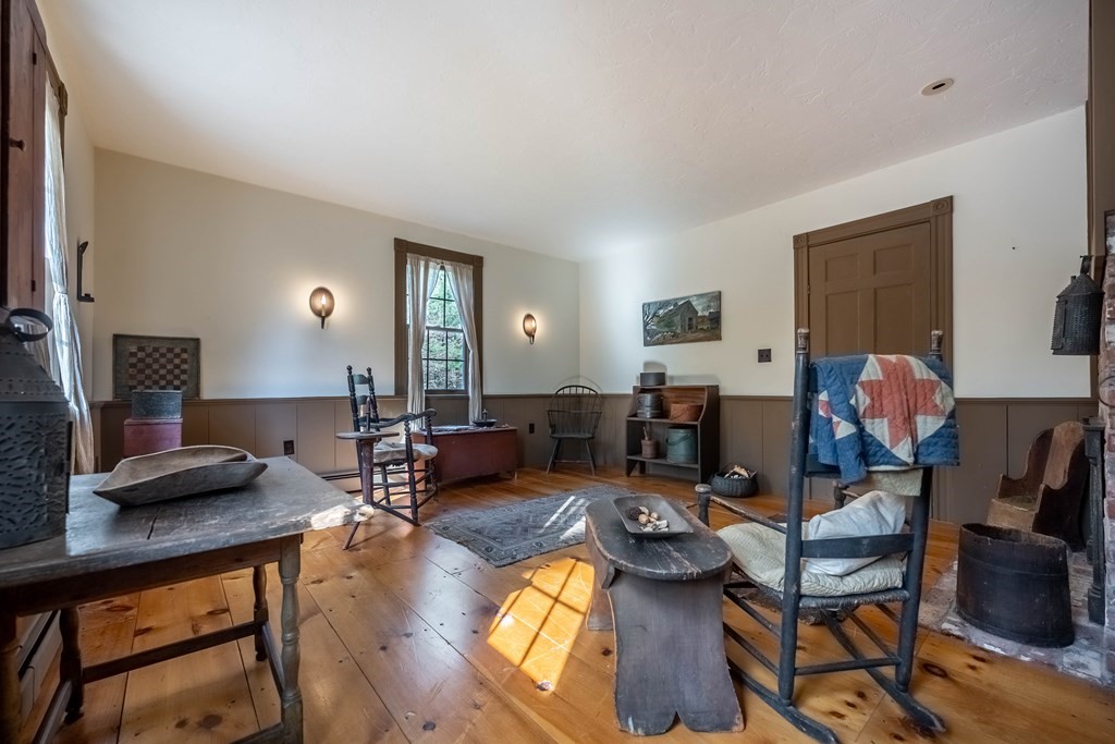 400 Main Street Boxford, MA 01921 - Photo 16 of 34 a living room with furniture and a flat screen tv