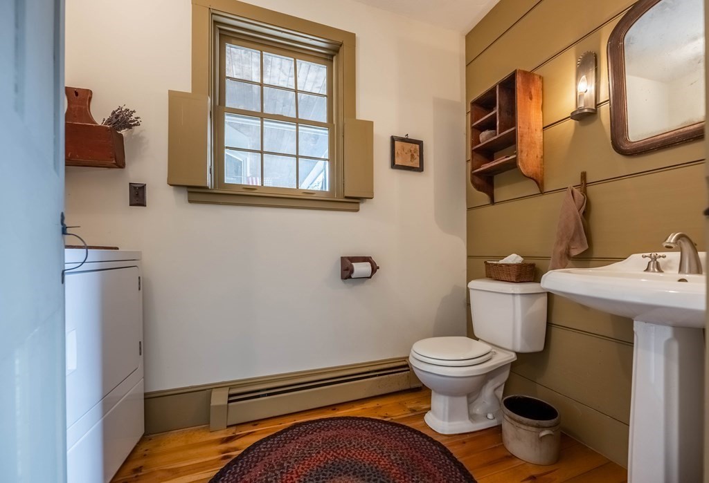 400 Main Street Boxford, MA 01921 - Photo 19 of 34 a bathroom with a sink and a toilet