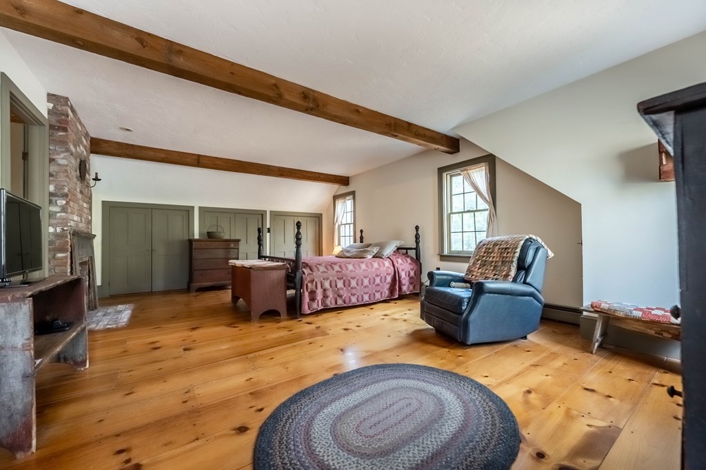 400 Main Street Boxford, MA 01921 - Photo 27 of 34 a living room with furniture and a flat screen tv