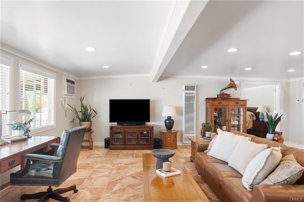 66125 Brant Cross Joshua Tree, CA 92252 - Photo 17 of 35 a living room with furniture and a flat screen tv