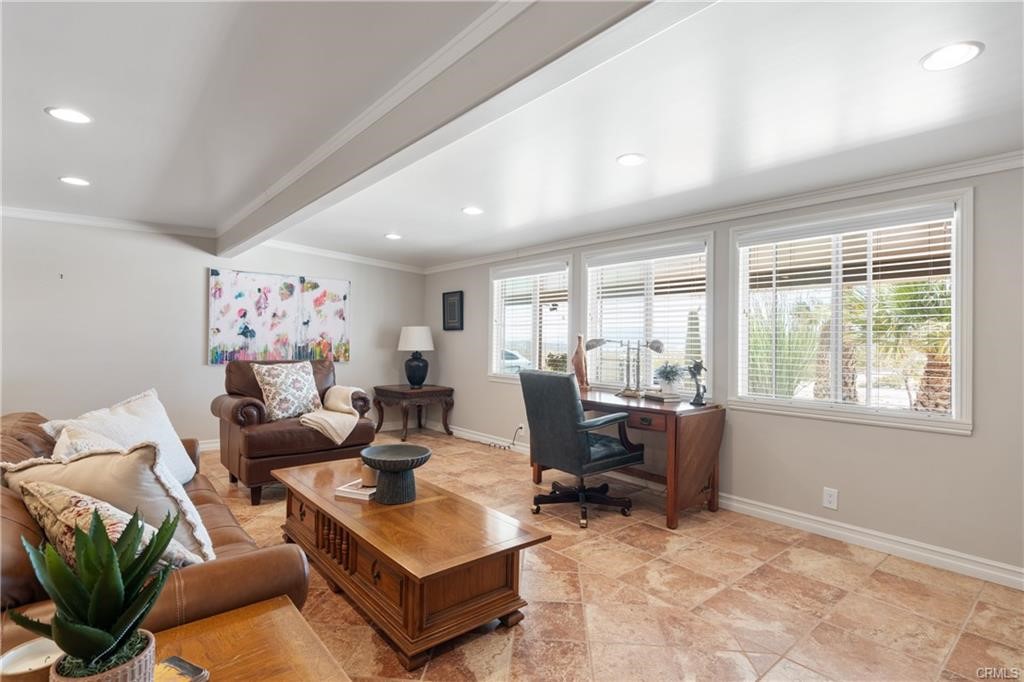 66125 Brant Cross Joshua Tree, CA 92252 - Photo 18 of 35 a living room with furniture large window and a table