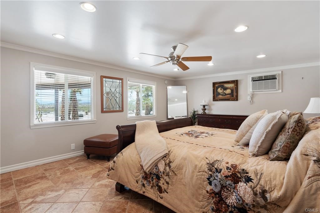 66125 Brant Cross Joshua Tree, CA 92252 - Photo 22 of 35 a bedroom with a bed and window
