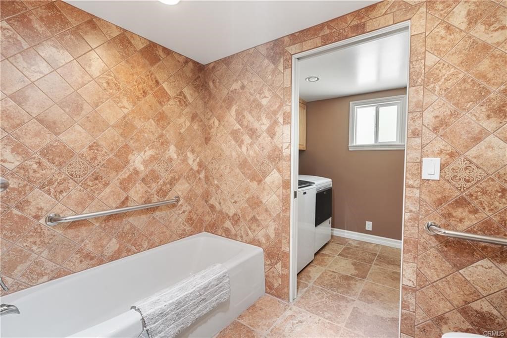 66125 Brant Cross Joshua Tree, CA 92252 - Photo 26 of 35 a bathroom with a bathtub and shower