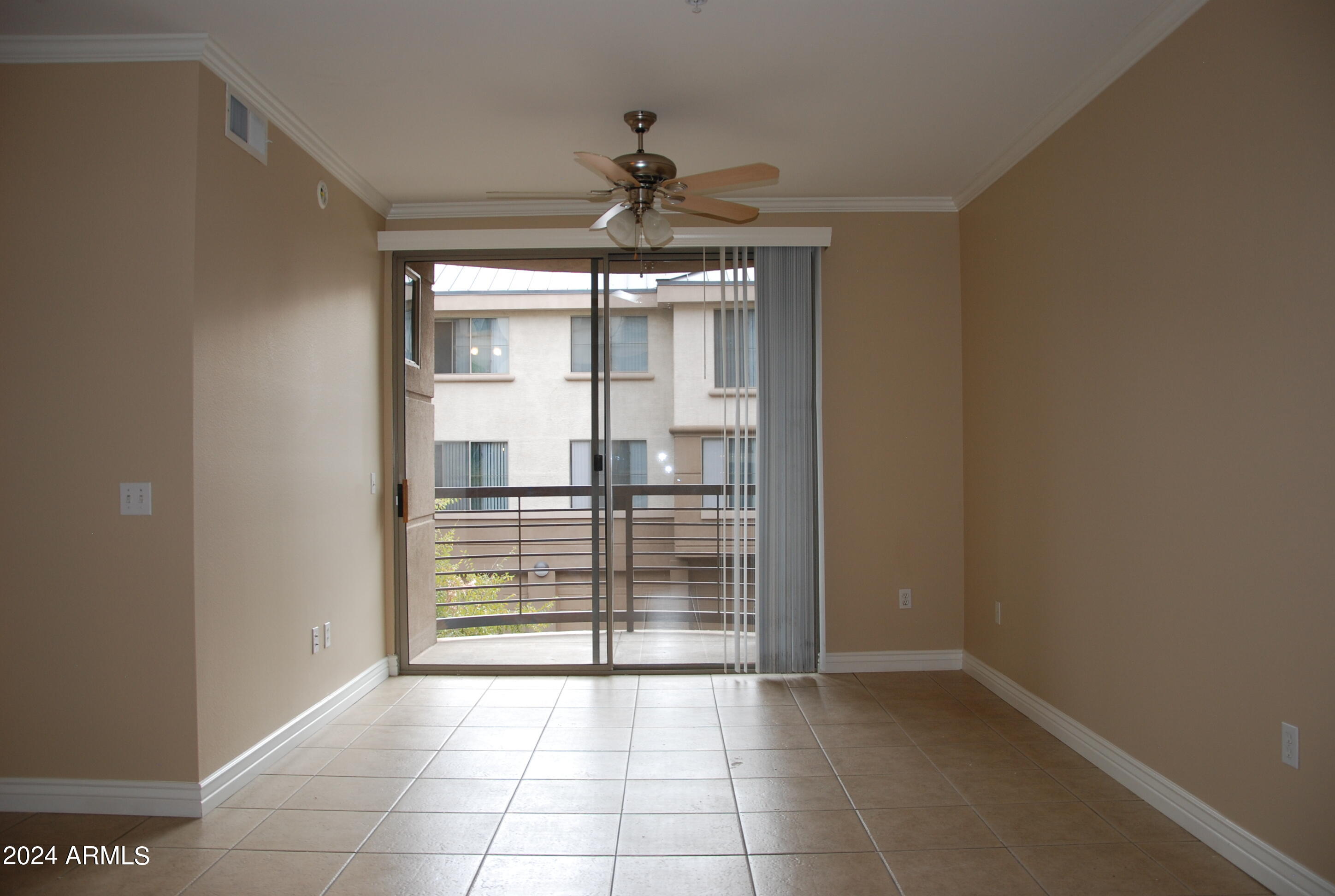 1701 East Colter Street, Unit 291 Phoenix, AZ 85016 - Photo 2 of 32 a view of an empty room with a window
