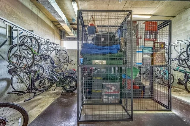 a room with lots of furniture and wooden floors