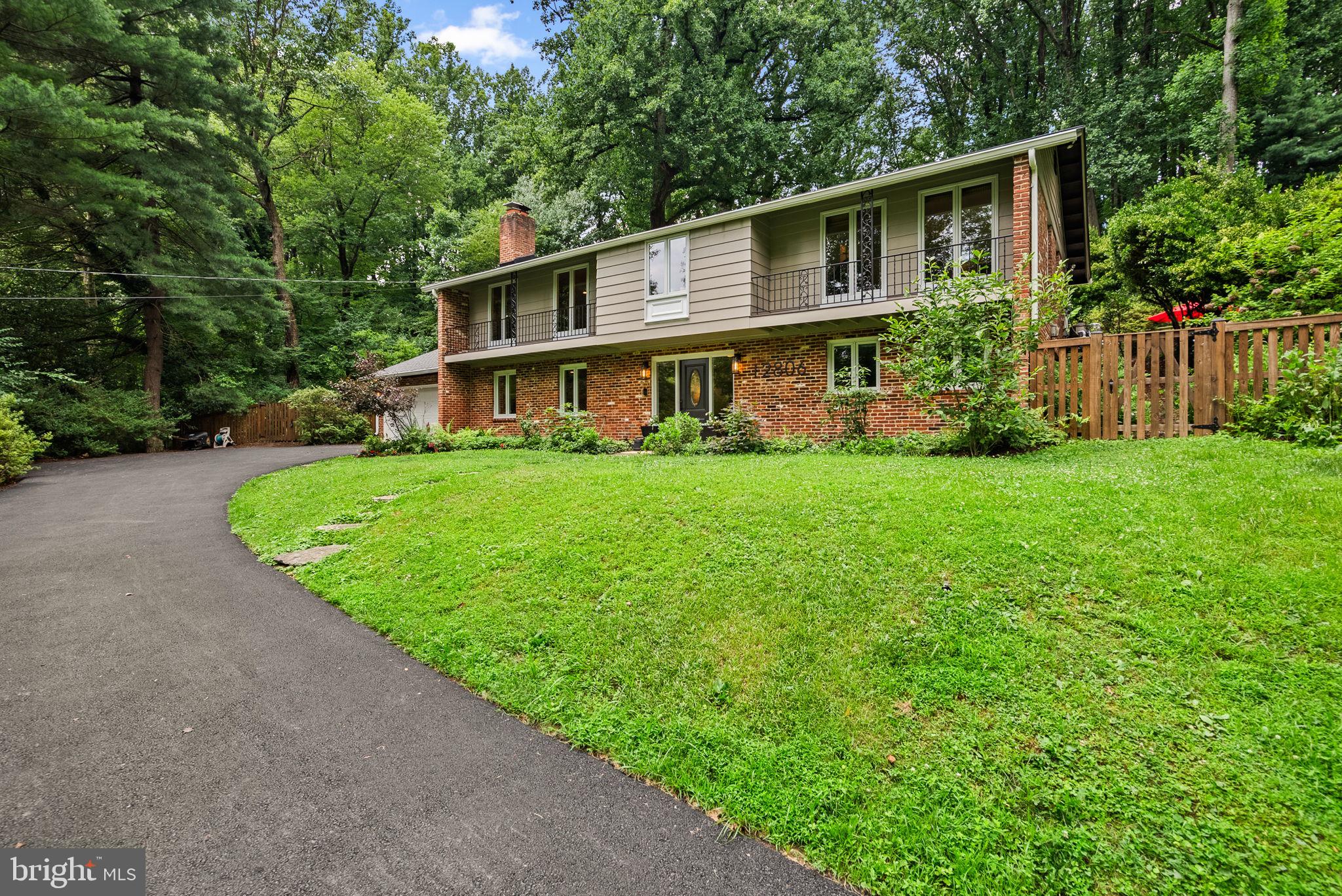 12806 Gaffney Road Silver Spring, MD 20904 - Photo 3 of 57 a view of a house with a yard