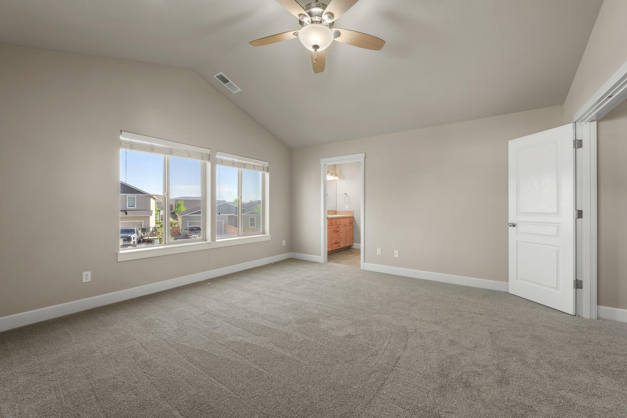 1402 Northeast Hudspeth Road Prineville, OR 97754 - Photo 17 of 36 a view of an empty room with a window