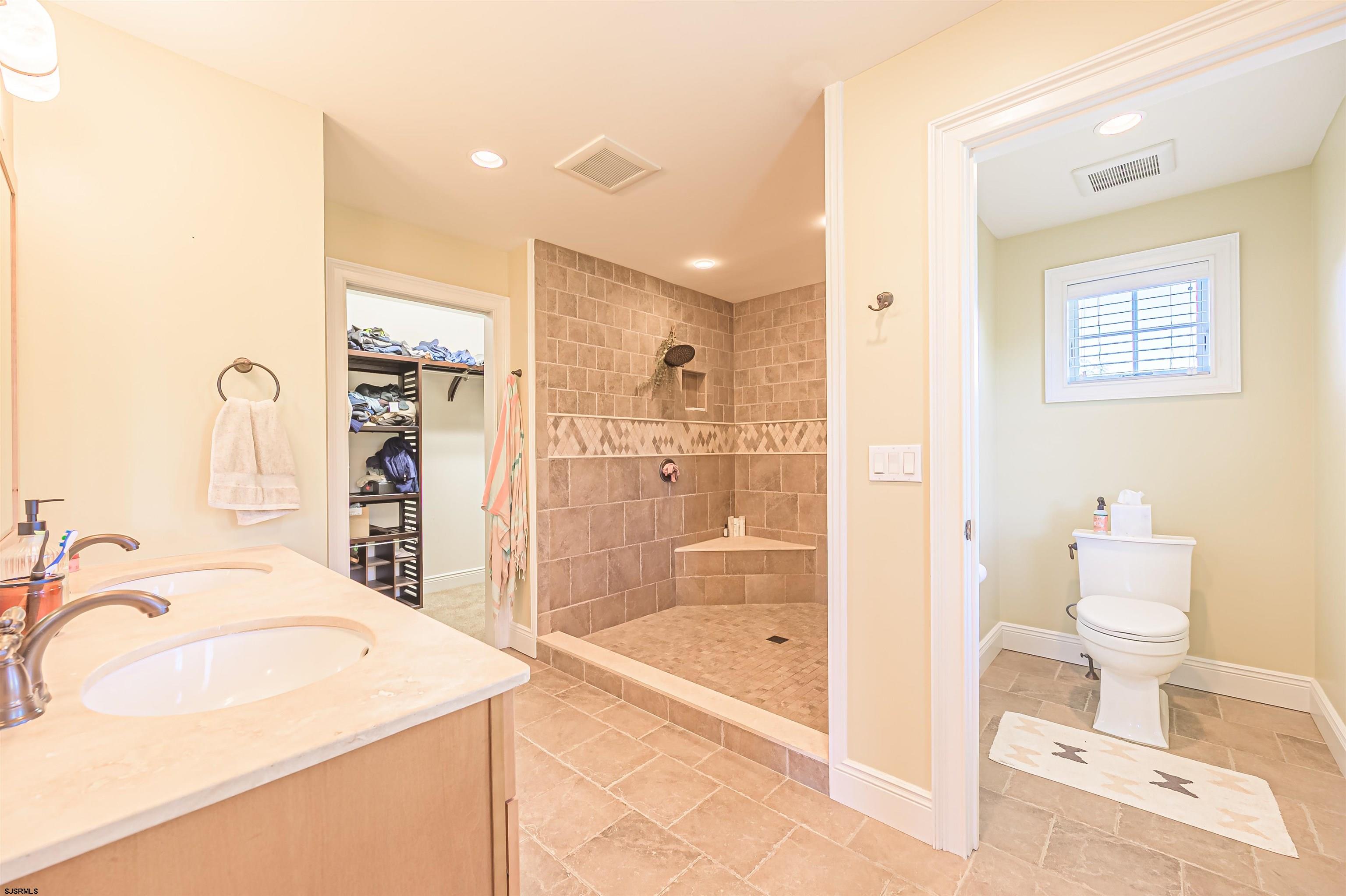 9 Thicket Street Ocean View, NJ 08230 - Photo 15 of 37 a bathroom with a sink toilet and shower