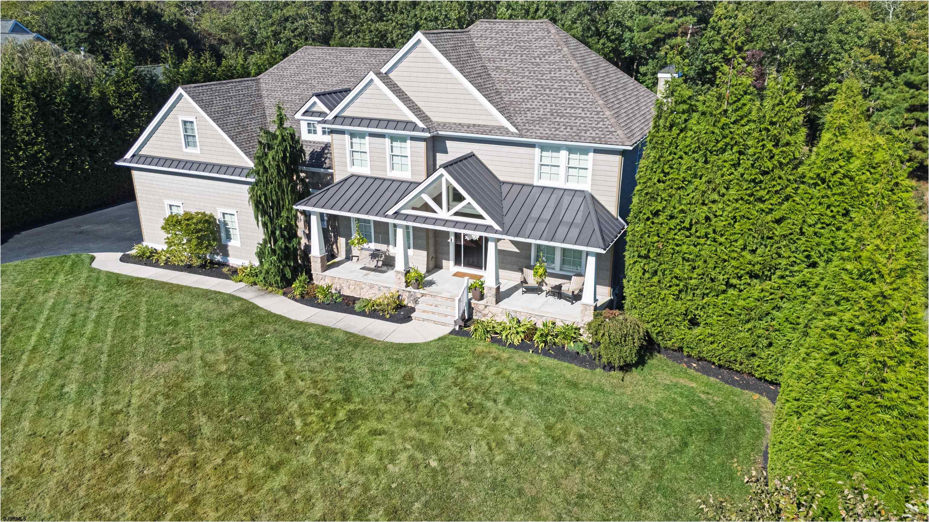 9 Thicket Street Ocean View, NJ 08230 - Photo 2 of 37 an aerial view of a house