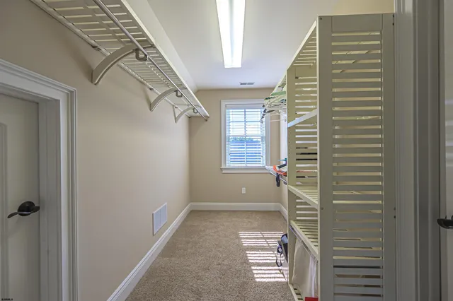 a view of an entryway with a door