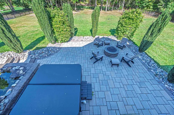 a view of a backyard with plants