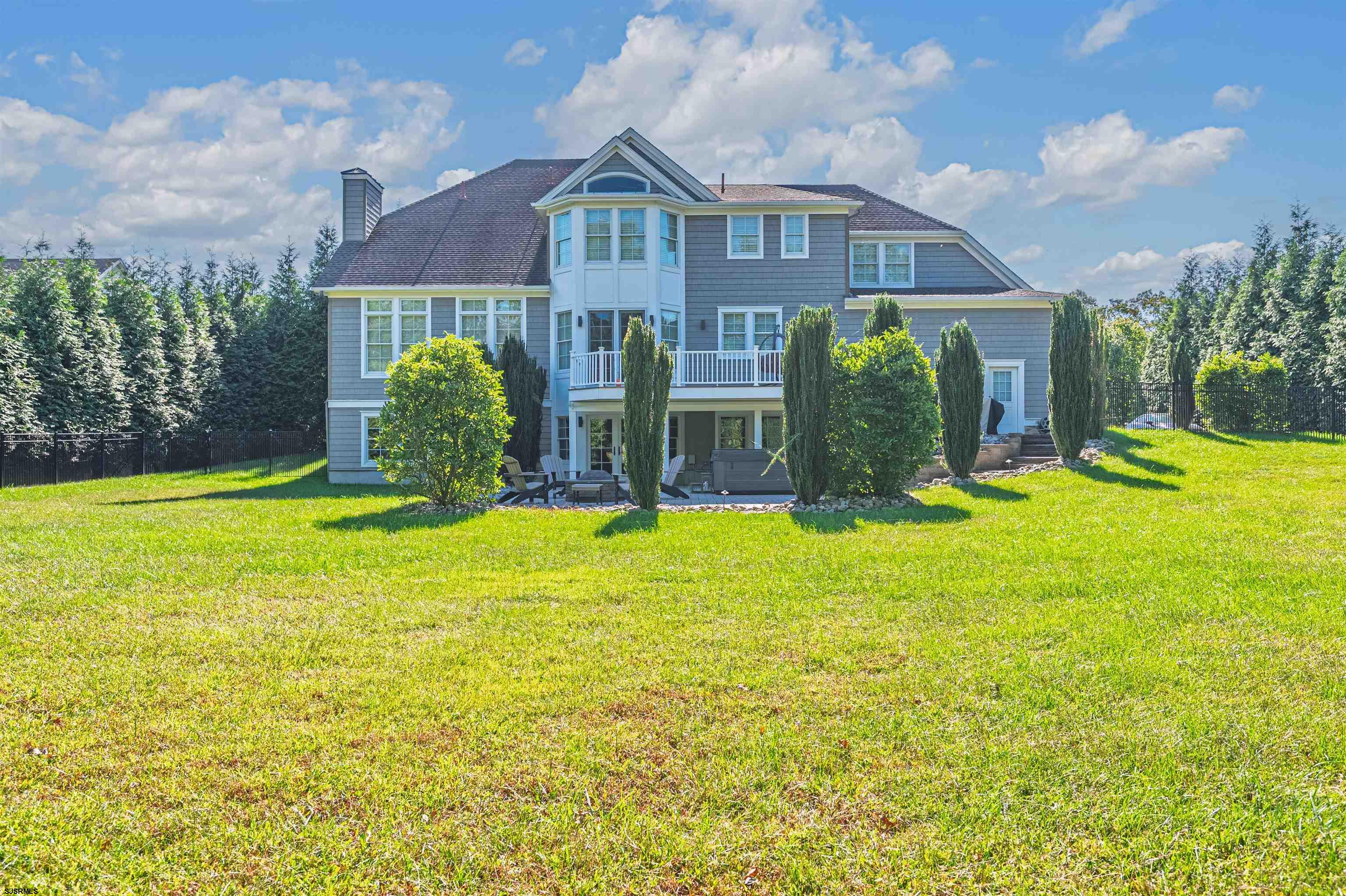 9 Thicket Street Ocean View, NJ 08230 - Photo 33 of 37 a view of a house with a yard
