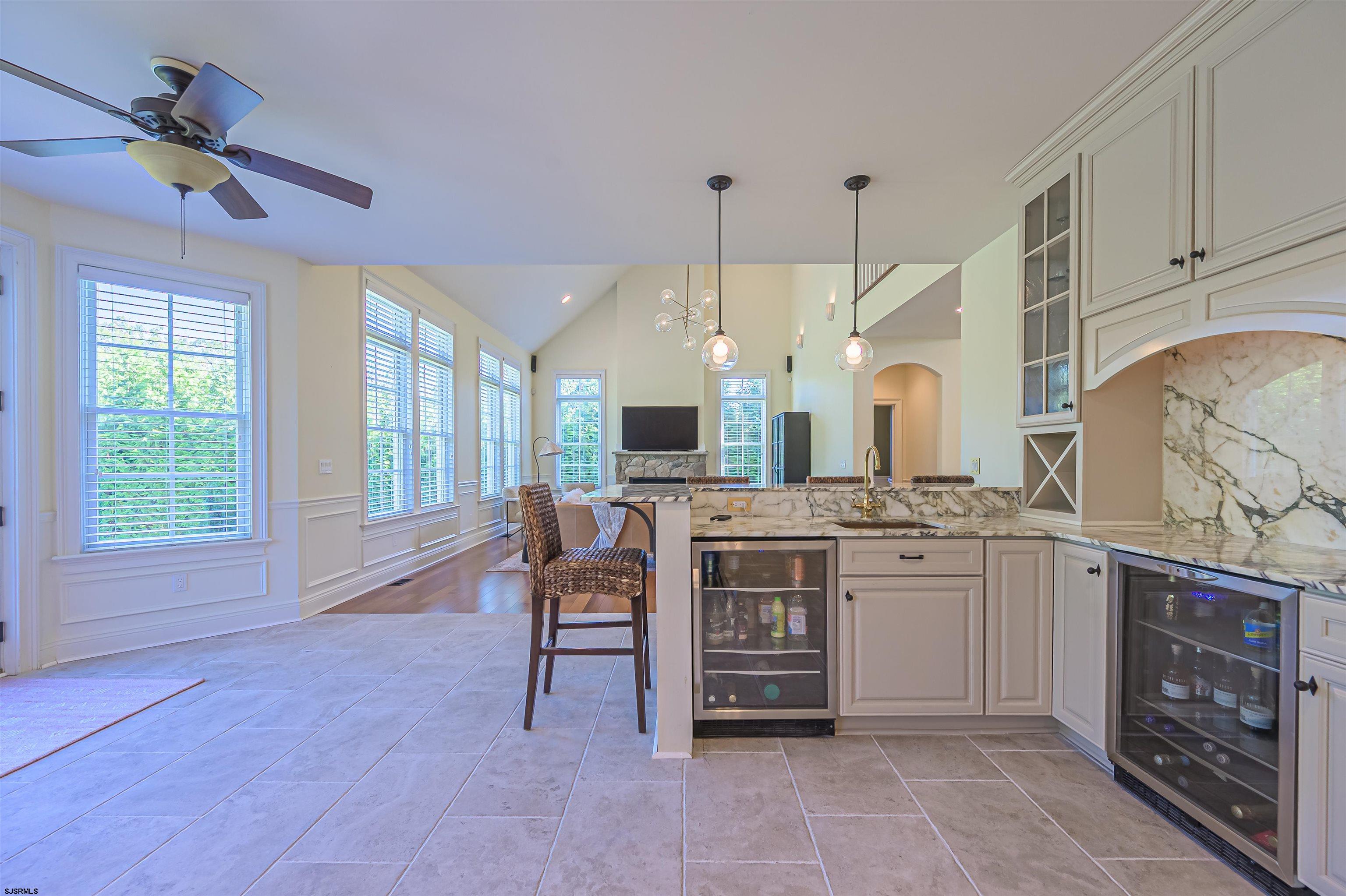 9 Thicket Street Ocean View, NJ 08230 - Photo 7 of 37 a open kitchen with stainless steel appliances granite countertop a stove and cabinets