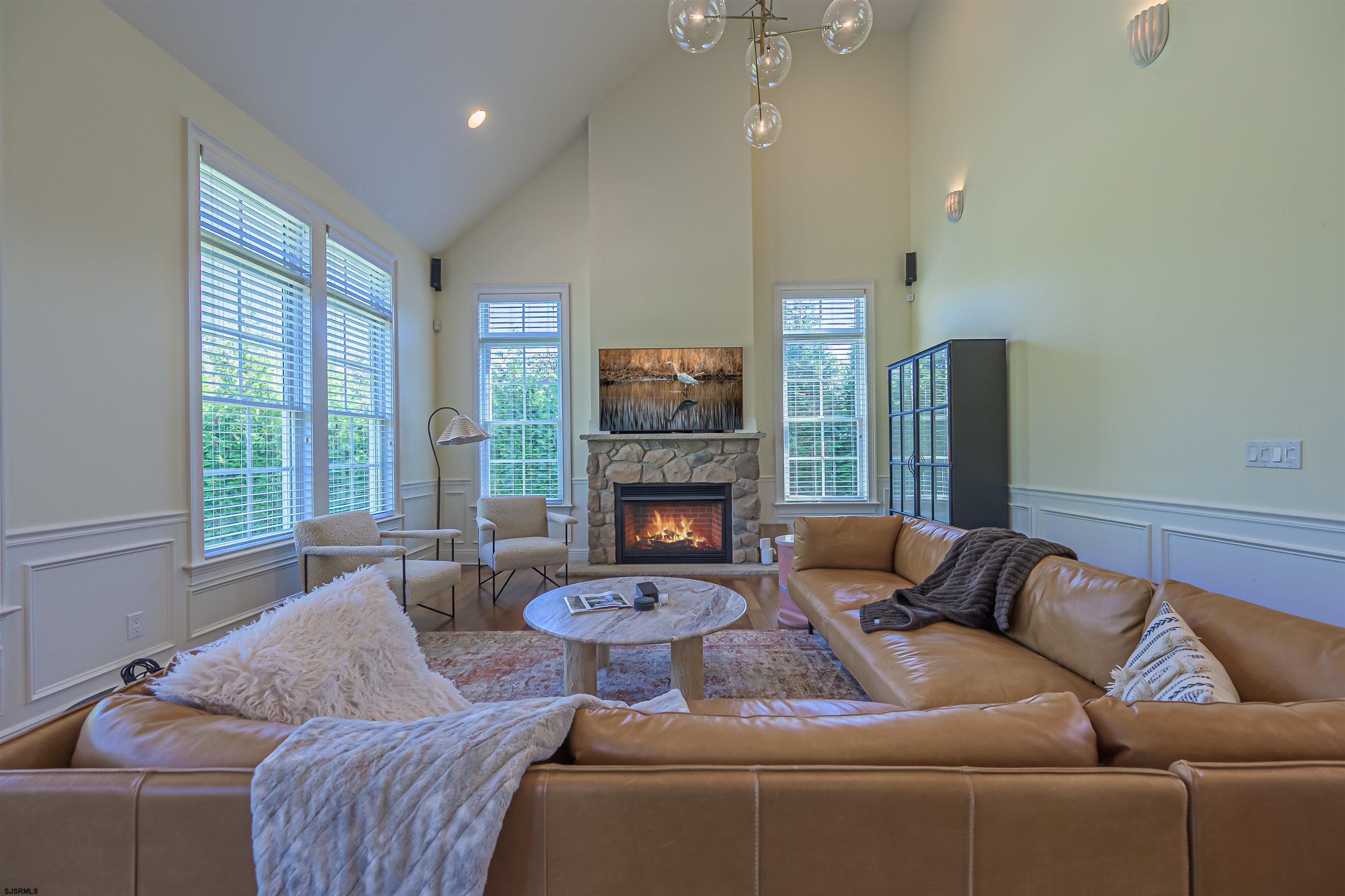 9 Thicket Street Ocean View, NJ 08230 - Photo 10 of 37 a living room with furniture and a fireplace