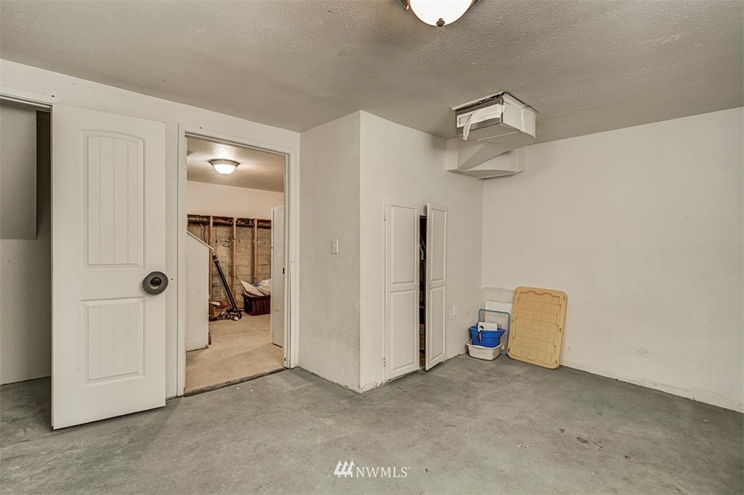 103 Logan Avenue South Renton, WA 98057 - Photo 13 of 19 a view of a room with closet
