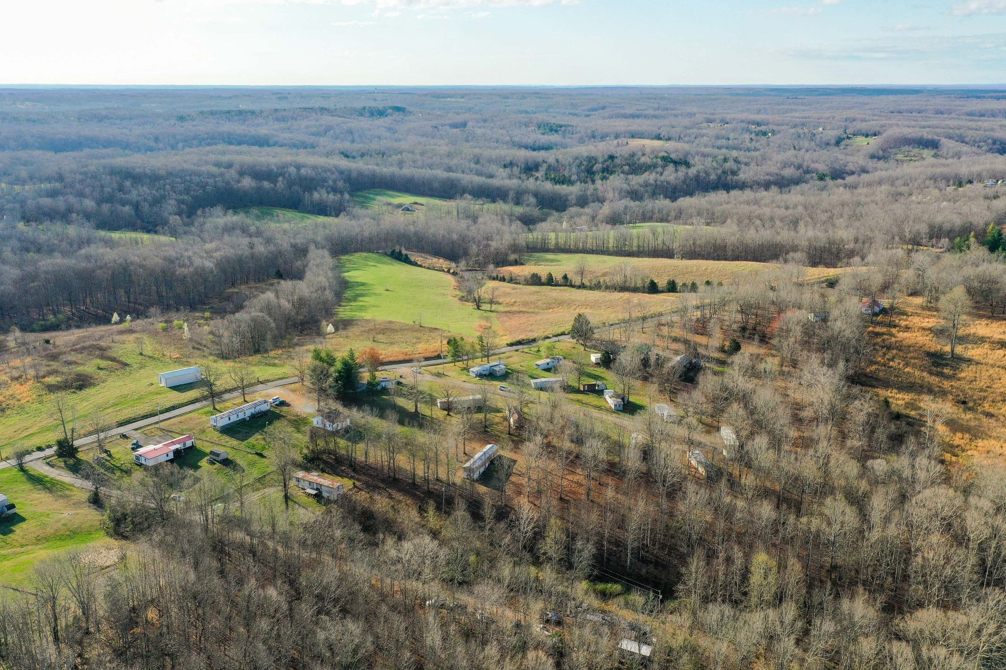 9812 Rocky Point Road Bon Aqua, TN 37025 - Photo 25 of 48 an aerial view of residential house with outdoor space