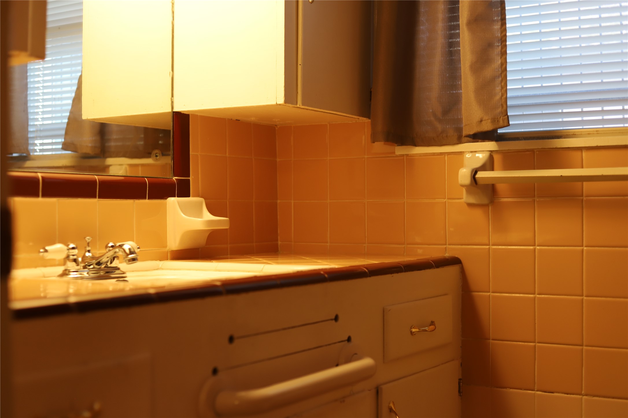 6106 Felix Avenue Austin, TX 78741 - Photo 17 of 20 a bathroom with a sink and a mirror
