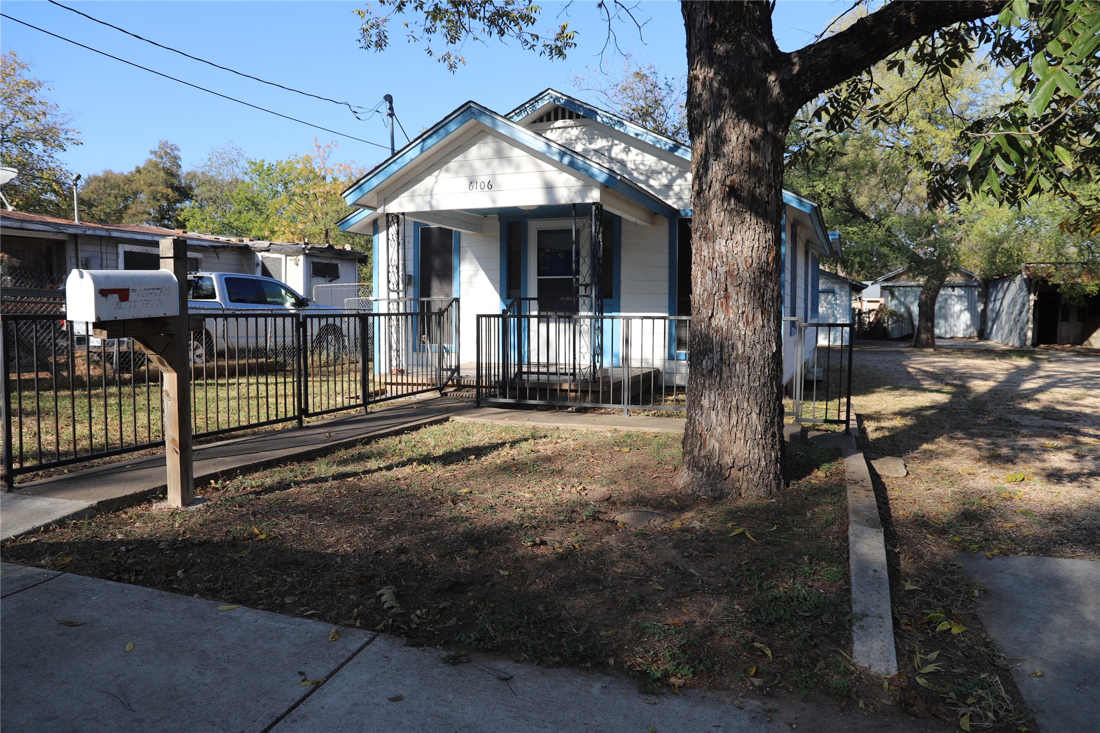 6106 Felix Avenue Austin, TX 78741 - Photo 2 of 20 a view of a house with wooden fence next to a road