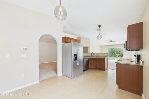 a view of a kitchen with a sink
