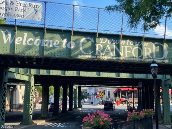 a view of a shop with a outdoor seating