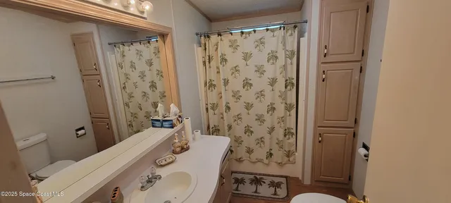a bathroom with a bathtub and shower