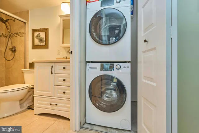 a bathroom with a washer and dryer