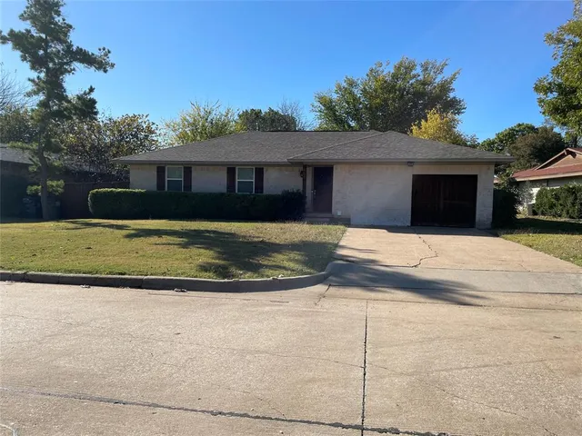 a front view of a house with yard