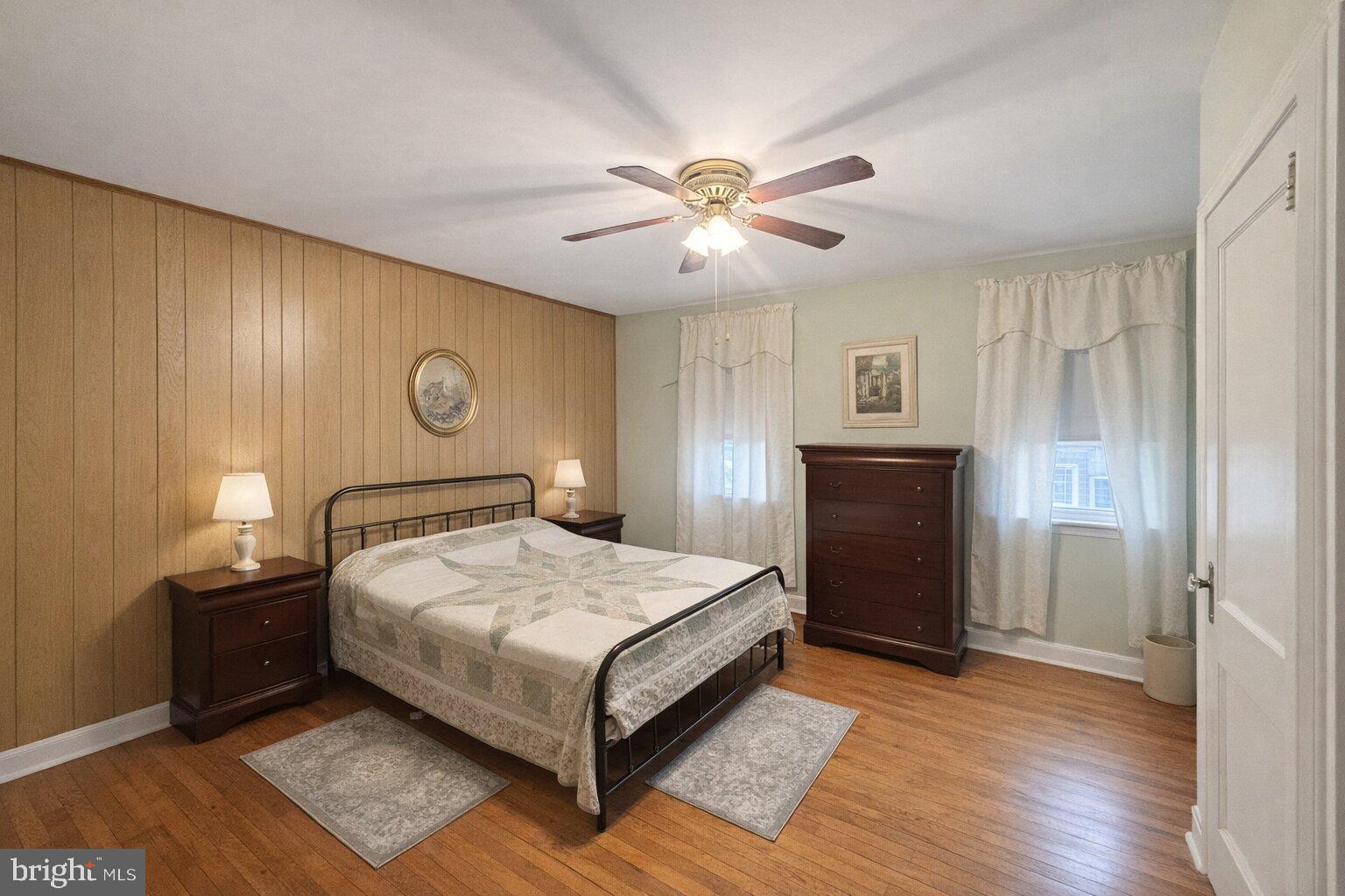 6628 Erdrick Street Philadelphia, PA 19135 - Photo 4 of 4 Cozy bedroom with warm wooden accents.