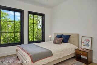 490 Old Rte 82 Hudson, NY 12534 - Photo 26 of 38 a bedroom with a large bed and a window