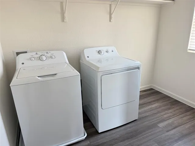 a utility room with dryer and washer